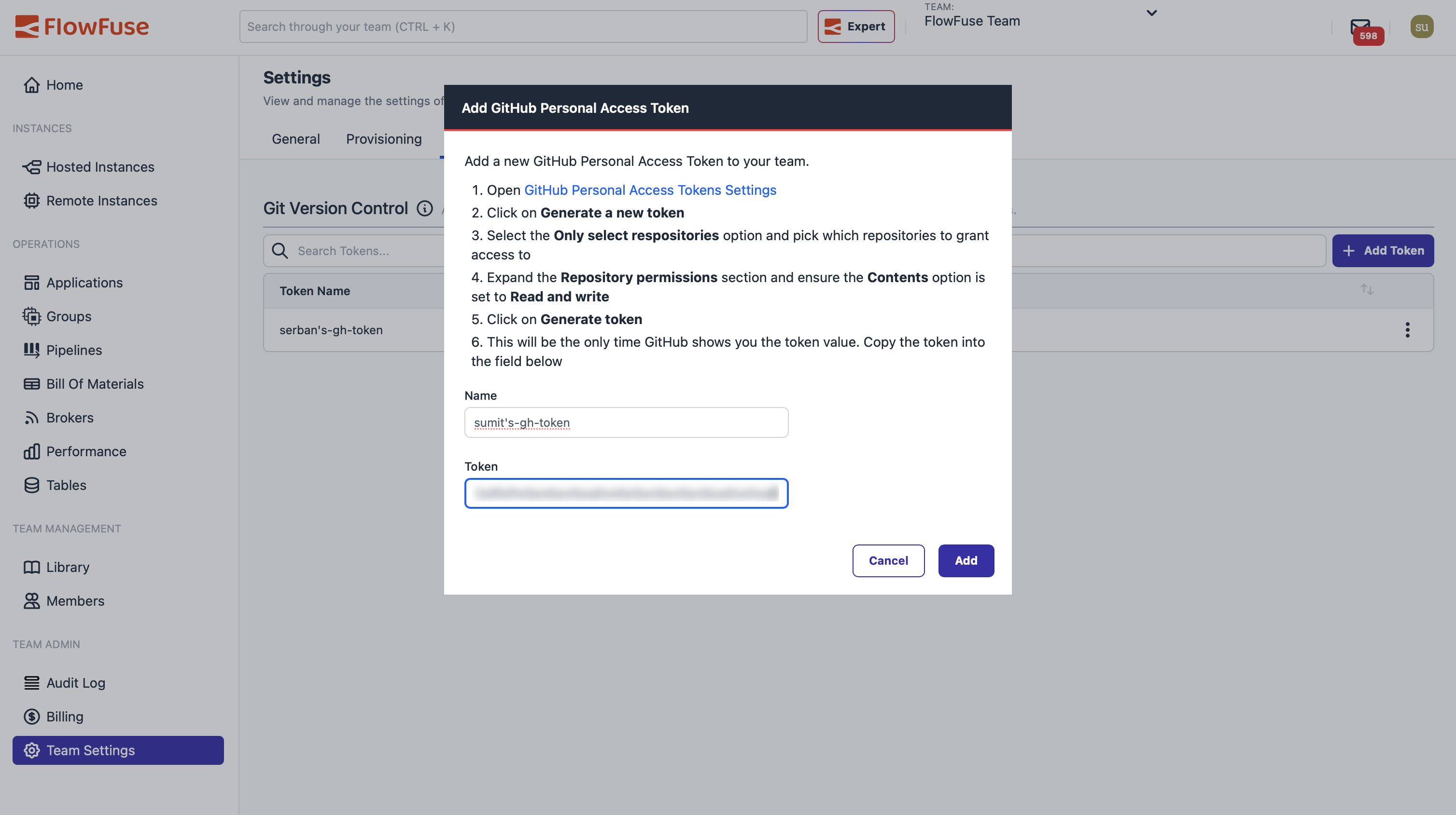 Screenshot of the Add Token dialog where users enter their GitHub Personal Access Token